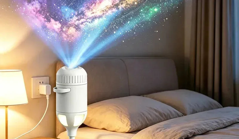 Starry Sky Projector beside a bed, projecting onto the ceiling